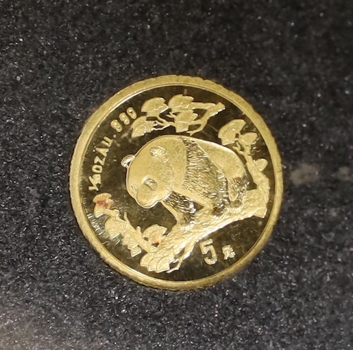 A Jamaica 1972 10th anniversary of independence proof gold $20, an Edward VII gold half sovereign 1903 and a China gold 5 yuan 1997